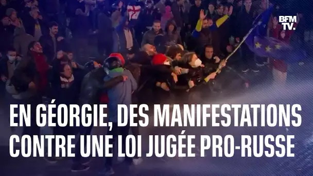 En Géorgie, une manifestante brandit un drapeau européen contre un projet de loi controversé