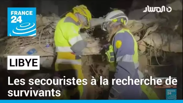 "Silence!": les secouristes à la recherche de survivants après les inondations à Derna