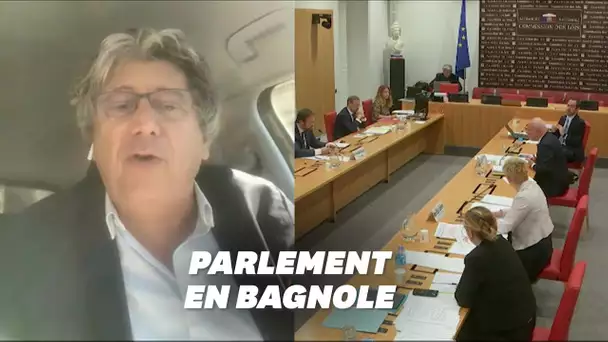 Depuis sa voiture, le député Éric Coquerel intervient en commission parlementaire