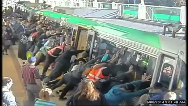 Ils poussent le train pour libérer un passager coincé