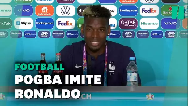 Paul Pogba retire une bouteille de bière du décor d'une conférence de presse