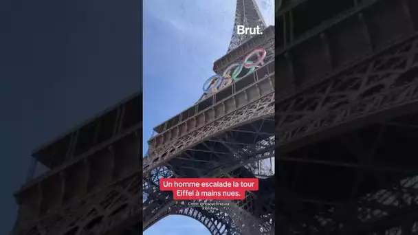 Un homme escalade la tour Eiffel à mains nues #paris2024