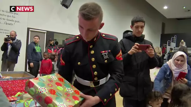 Seine-Saint-Denis : des cadeaux de Noël distribués par des Marines américains aux enfants de Stains