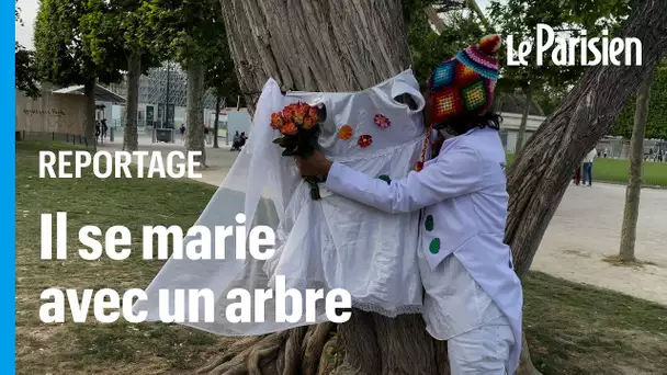 Un homme épouse un arbre au pied de la tour Eiffel... pour éveiller les consciences