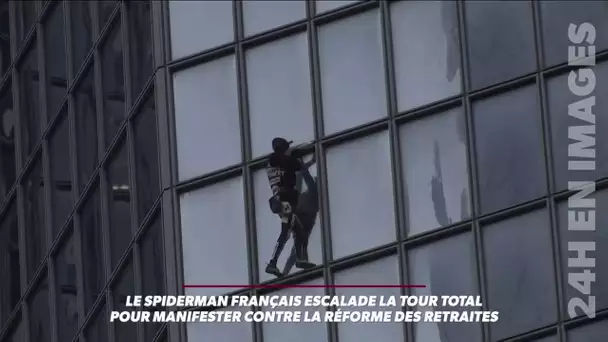 Le Spider-man français escalade la Tour Total pour manifester contre la réforme des retraites