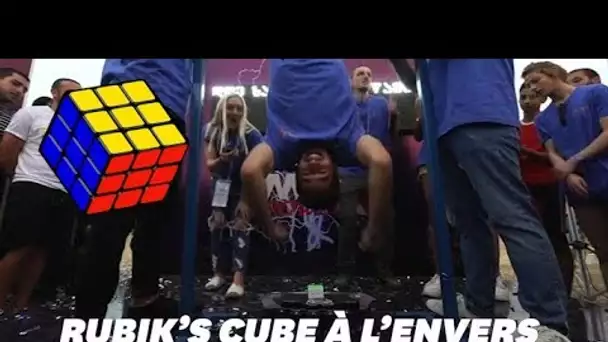 Record mondial: Il résout un Rubik's Cube en treize secondes la tête à l'envers