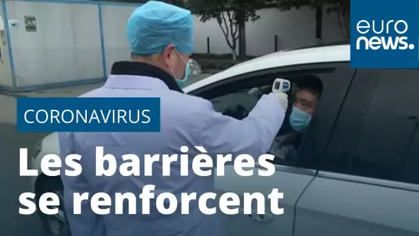 Coronavirus chinois : le bilan s'alourdit, les barrières se renforcent