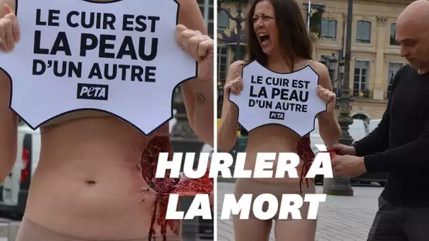 Pendant la Fashion Week, une militante de Peta fait mine de s'arracher la peau